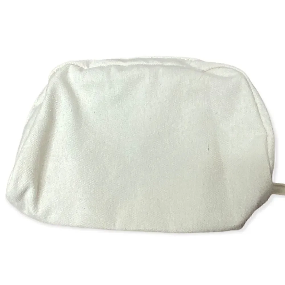 Origins cream canvas make up bag with zip closure small marks inside